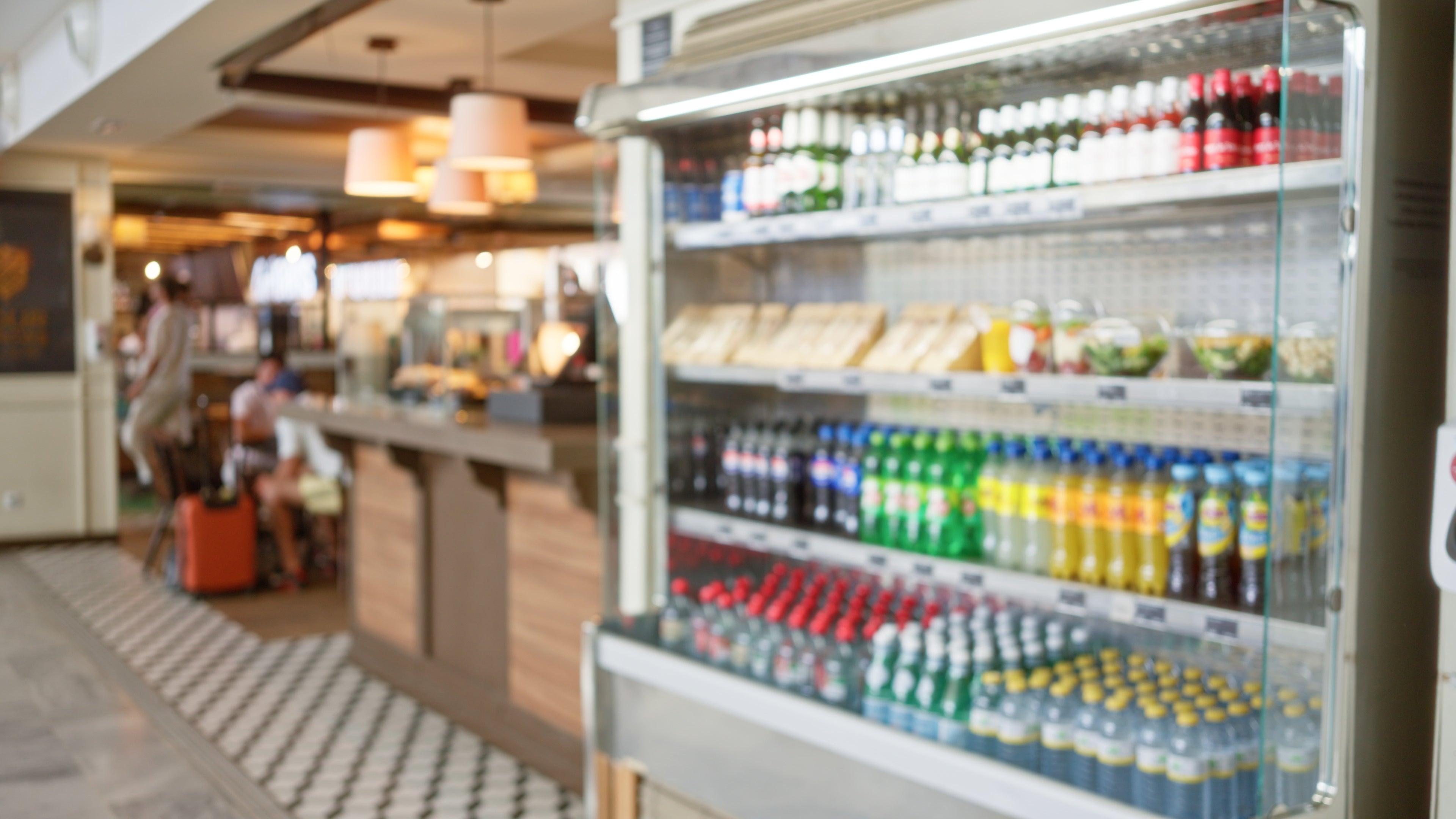Fridge stocked with drinks in a casual dining setting